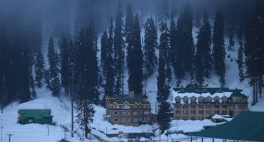 Srinagar, Kashmir, India: Snow capped mountains at famous place of Kashmir called Gulmarg. Gulmarg is in the Pir Panjals, one of the six ranges which make up the Himalayas.