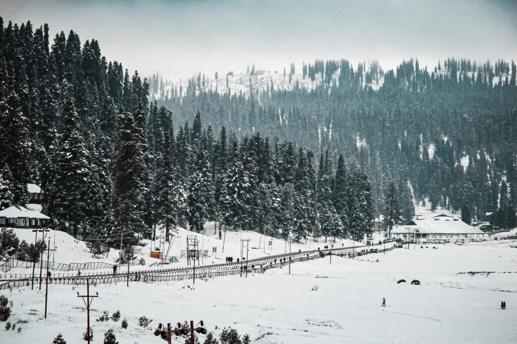 Gulmarg Gondola with snow-covered landscapes in the background